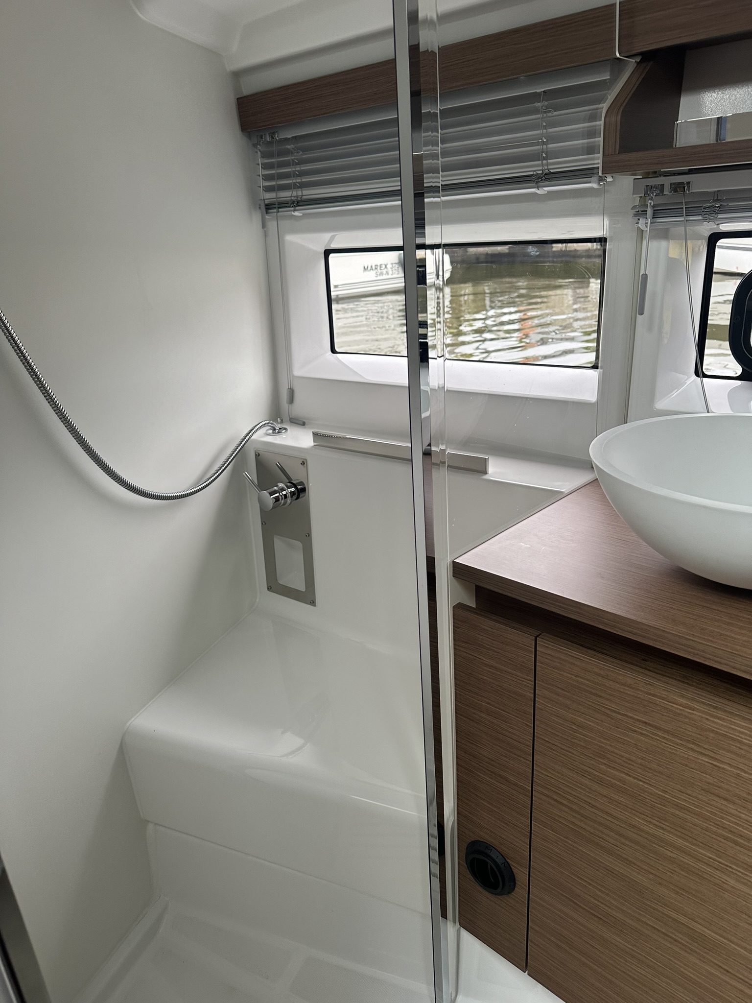 Yacht shower area before - shower with gray stone optic film